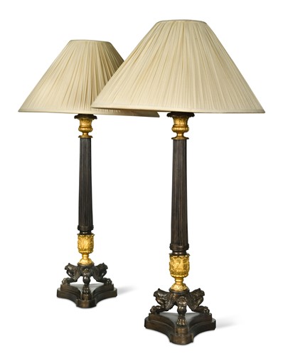 Lot 346 - A large pair of Empire style faux-bronze and ormulu table lamps
