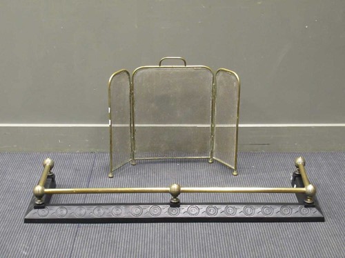 Lot 390 - A 19th century brass and iron fender 14 x 120...