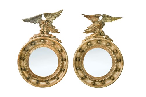 Lot 410 - A pair of Regency convex mirrors