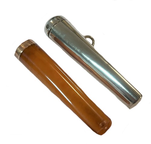 Lot 406 - A 9ct gold and amber cheroot holder in a silver case