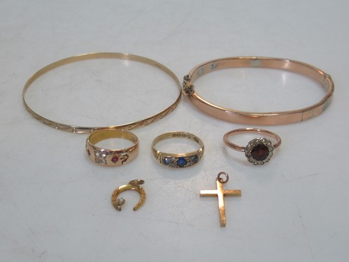 Lot 153 - A hallmarked 18ct gold sapphire and diamond...