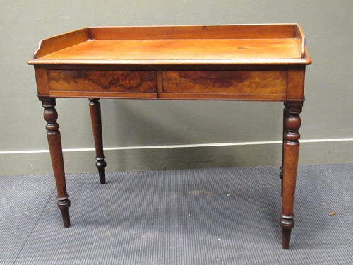 Lot 482 - A 19th century mahogany writing desk with...