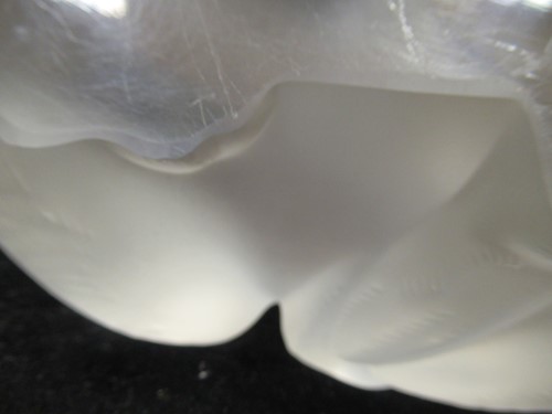 Lot 11 - A Lalique cat, in prone position, 12 x 24 x 13cm