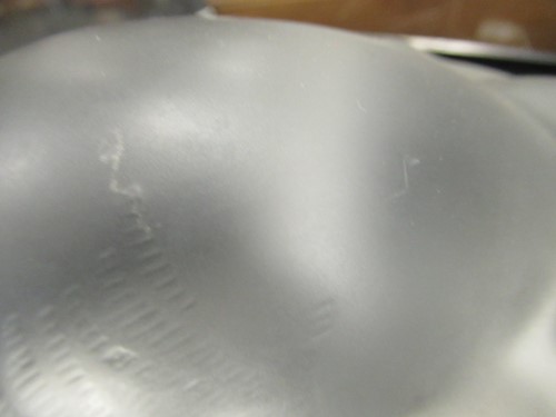 Lot 11 - A Lalique cat, in prone position, 12 x 24 x 13cm