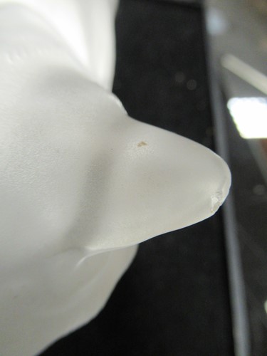 Lot 11 - A Lalique cat, in prone position, 12 x 24 x 13cm