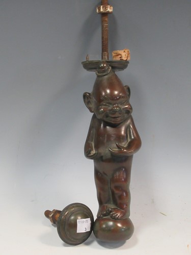 Lot 75 - A bronzed metal door knocker with lucky imp...