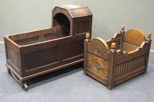 Lot 317 - An 18th century oak childs cradle, 77 x 90 x...