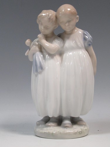 Lot 48 - A Royal Copenhagen group of two children in...