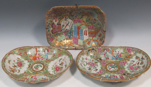 Lot 1 - Three Canton porcelain platters, decorated...