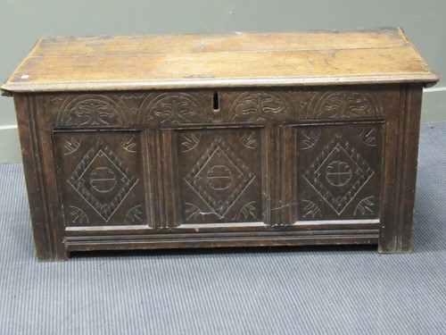 Lot 484 - A 19th century oak carved panelled coffer, 56...