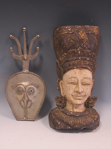 Lot 64 - An Indonesian style carved and painted wooden...