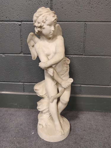 Lot 405 - A stone figure of cupid with his bow, 74cm tall