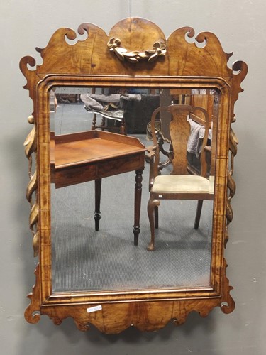 Lot 284 - An 18th century style walnut and parcel gilt...