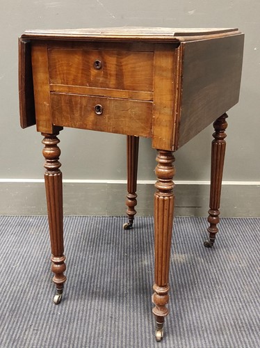 Lot 292 - A Regency mahogany work table with reeded...