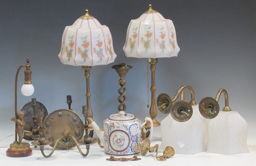 Lot 86 - A collection of brass lamps and fittings,...