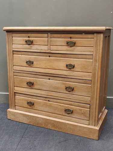 Lot 338 - A late 19th century ash chest of drawers, 102...