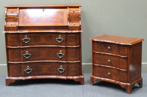 Lot 372 - A reproduction walnut serpentine fronted...