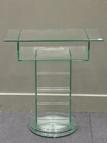 Lot 373 - A 20th century glass and chrome revolving...