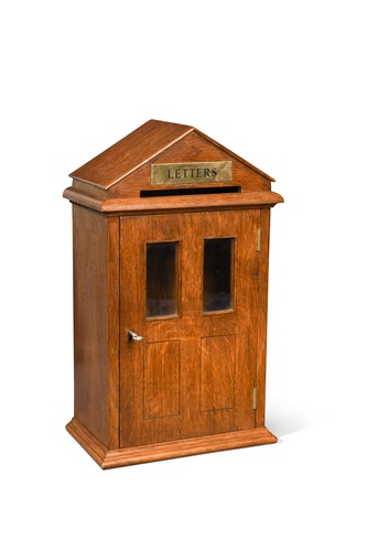 Lot 554 - An oak letter box, 20th century