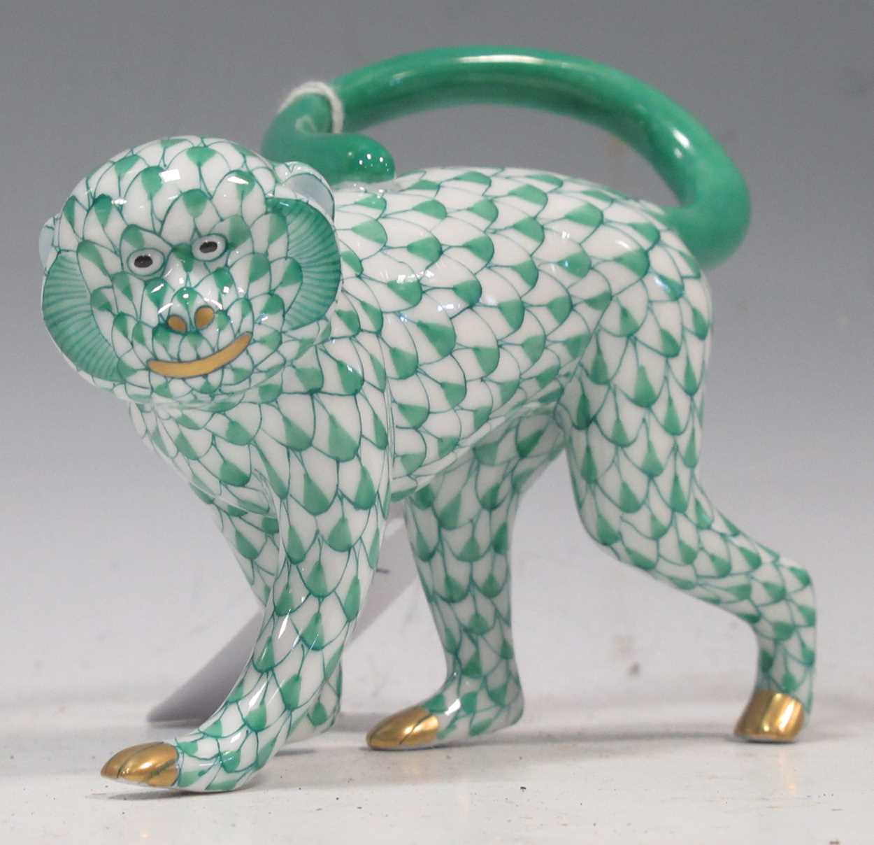 Lot 50 - Herend green fishnet walking monkey no.15391,...