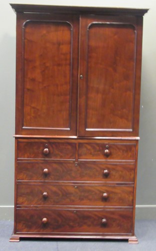 Lot 325 - A 19th century mahogany linen press, the...