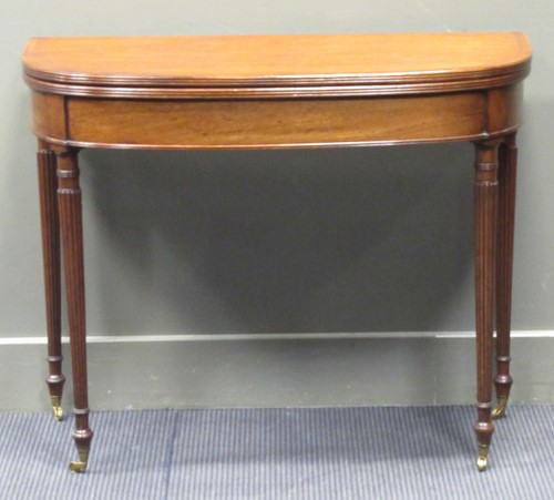 Lot 377 - A late George III line inlaid mahogany tea...