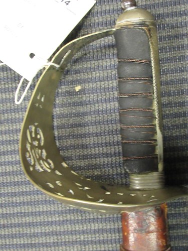 Lot 114 - A Royal Engineers sword with leather scabbard,...