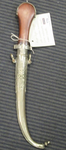 Lot 112 - An Asian style dagger with a wooden handle and...