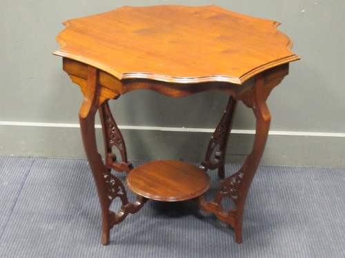 Lot 396 - An Edwardian two-tier mahogany occasional...