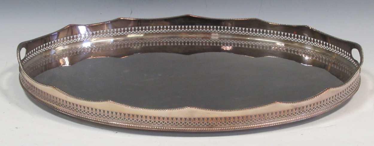 Lot 221 - An EPNS two-handled gallery tray, 59cm wide
