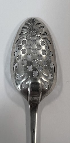 Lot 411 - An 18th century silver mote spoon