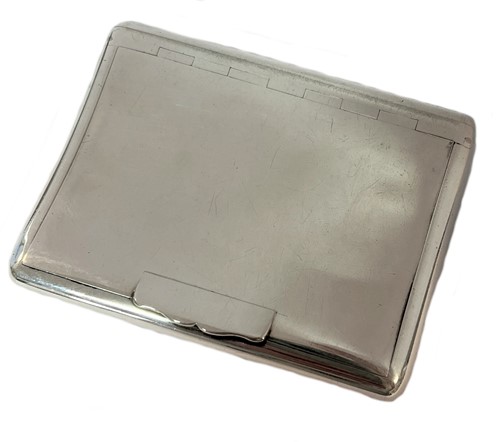 Lot 380 - An Edward VII silver pocket tobacco box