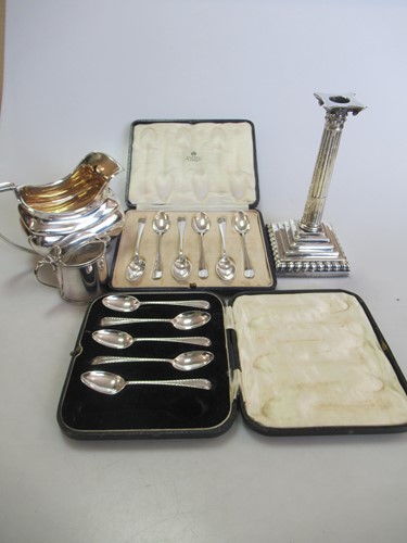 Lot 237 - An 18th century silver loaded candlestick, a...