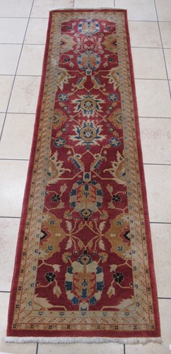 Lot 566 - A Turkish style runner, 308 x 82cm