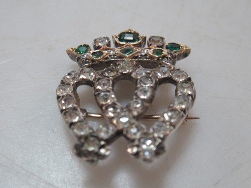 Lot 210 - A double heart paste brooch, weight 7.8g, cased