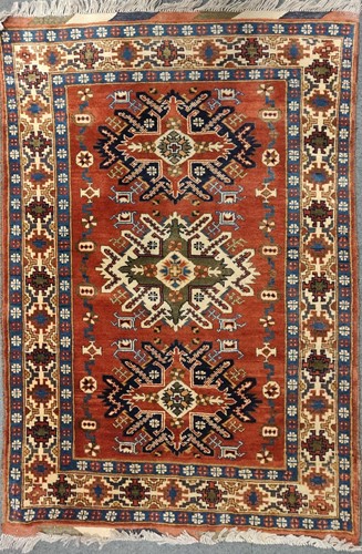 Lot 4 - A Kazak style rug with three medallions, 155 x...