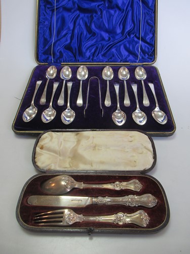 Lot 239 - A cased set of 12 silver teaspoons with sugar...