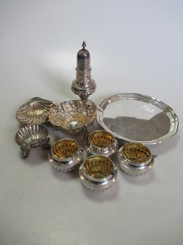 Lot 235 - A set of four silver salts with spoons,...