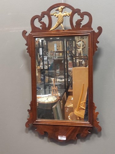 Lot 386 - A mahogany mirror with hoho bird, 19th century,...