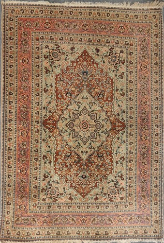 Lot 27 - An early 20th century Kashan rug with rust...
