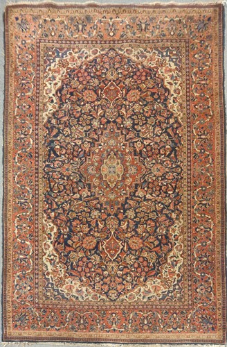 Lot 28 - An early 20th century Kashan rug of classic...