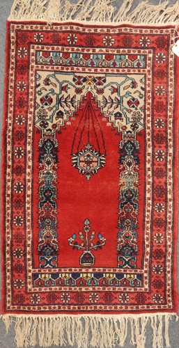 Lot 29 - Two 20th century prayer rugs, with a Belouchi...
