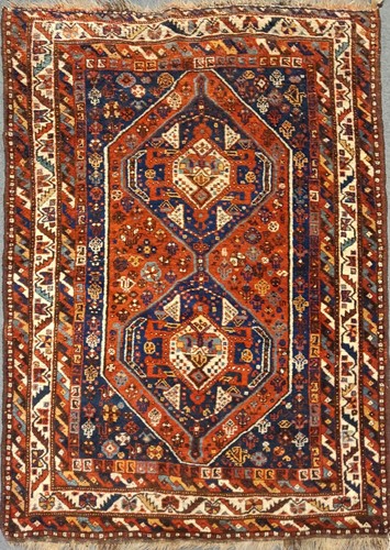 Lot 30 - An early 20th century Qashqai carpet with a...