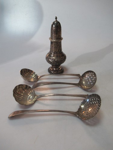 Lot 230 - A Chester marked silver caster together with...