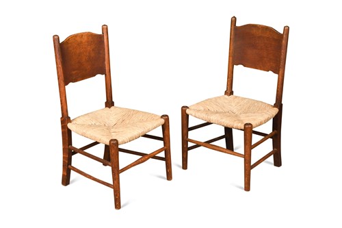 Lot 200 - In the manner of William Birch, a pair of stained ash child's chairs