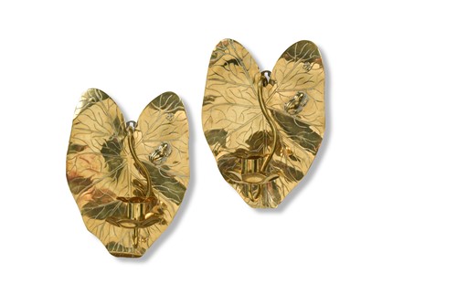 Lot 150 - A pair of Aesthetic Movement brass wall sconces