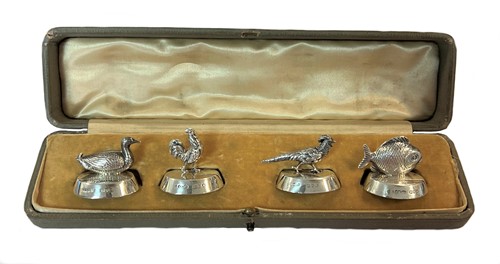 Lot 419 - A cased set of four silver novelty menu holders, mark of Sampson Mrodan