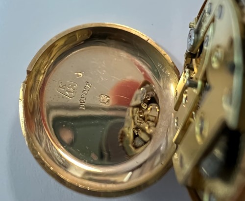 Lot 316 - J. Pourrat et Fils, Genève - A rare Swiss 18ct gold gem set lapel watch