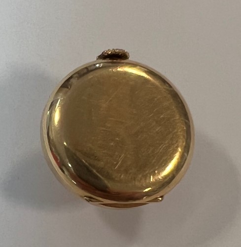 Lot 316 - J. Pourrat et Fils, Genève - A rare Swiss 18ct gold gem set lapel watch