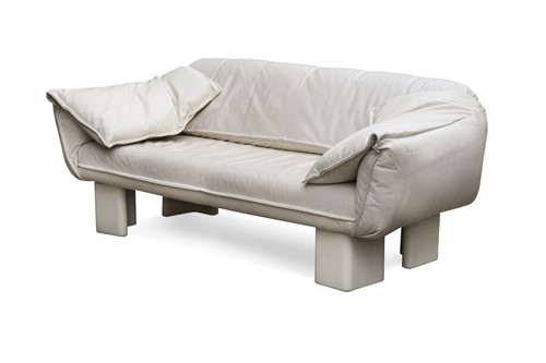 Lot 304 - A Danish cream leather two-seat sofa